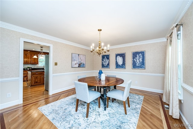 12911 Chipstead Rd, Chester, VA 23831 - dining area featuring a chandelier, light wood-style flooring, ornamental molding, baseboards, and wallpapered walls