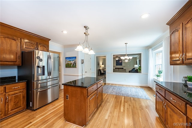 12911 Chipstead Rd, Chester, VA 23831 - kitchen featuring stainless steel refrigerator with ice dispenser, light wood-style floors, a center island, ornamental molding, and a chandelier