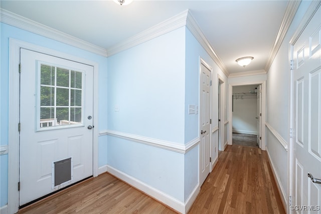 12911 Chipstead Rd, Chester, VA 23831 - doorway to outside with light wood-style flooring, baseboards, and ornamental molding