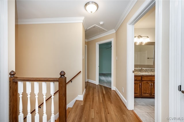 12911 Chipstead Rd, Chester, VA 23831 - hallway featuring attic access, an upstairs landing, ornamental molding, light wood-type flooring, and baseboards