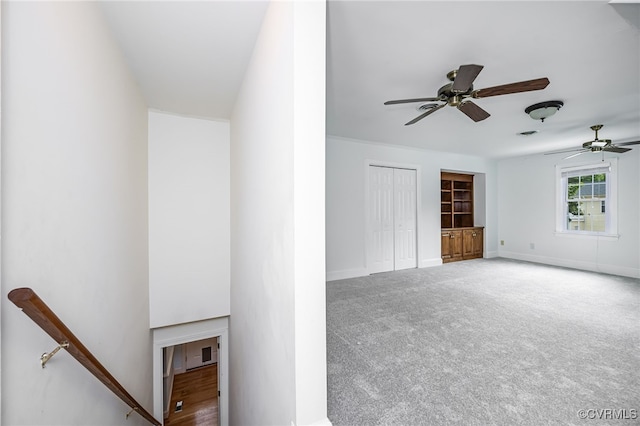 12911 Chipstead Rd, Chester, VA 23831 - unfurnished living room with ceiling fan, baseboards, and carpet floors