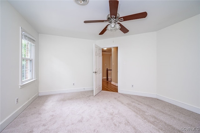 12911 Chipstead Rd, Chester, VA 23831 - spare room with carpet, a ceiling fan, and baseboards