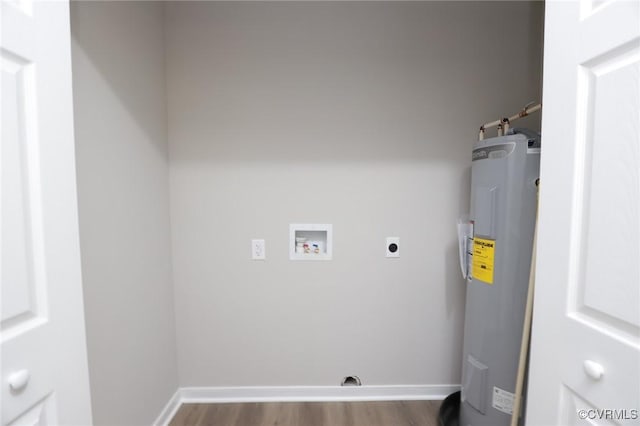 washroom featuring water heater, wood finished floors, hookup for an electric dryer, baseboards, and washer hookup