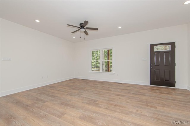 spare room with light wood-type flooring, recessed lighting, and ceiling fan