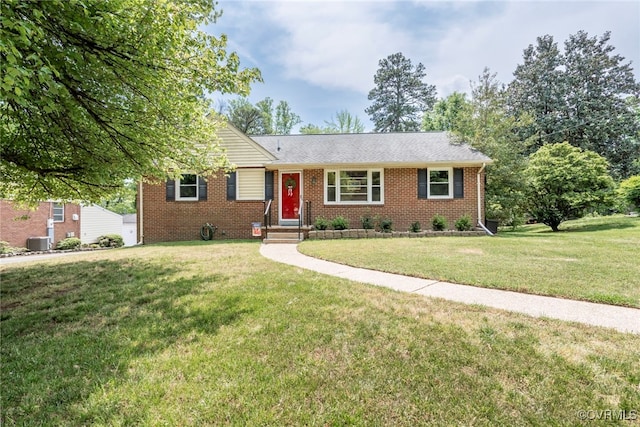 single story home with central air condition unit, a front yard, and brick siding