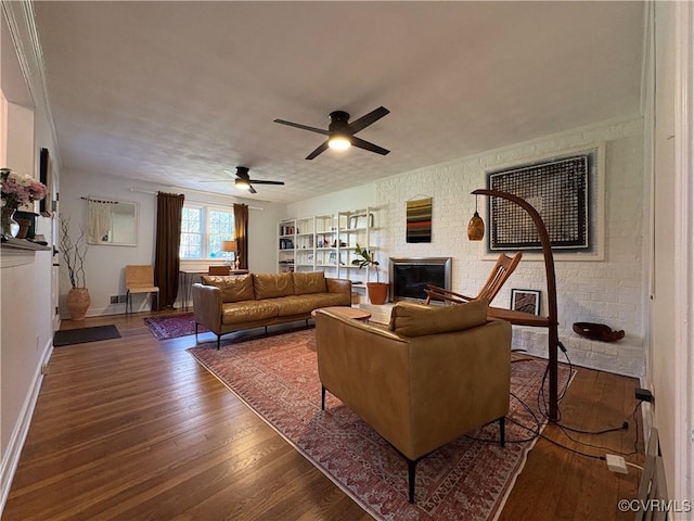 331 Harwick, North Chesterfield, VA 23236 - living area featuring a fireplace, wood finished floors, a ceiling fan, and baseboards