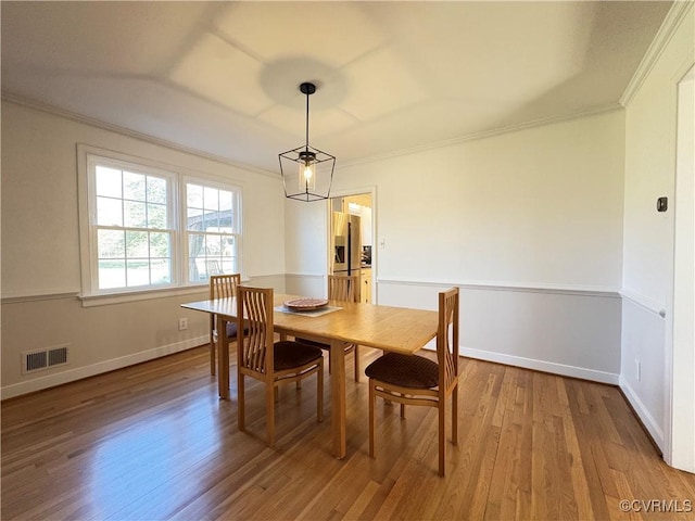 331 Harwick, North Chesterfield, VA 23236 - dining space with wood finished floors, visible vents, crown molding, and baseboards