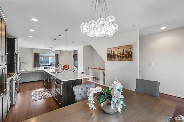 10925 Parkshire Ln, Henrico, VA 23233 - dining space featuring dark wood-style floors, recessed lighting, and a chandelier