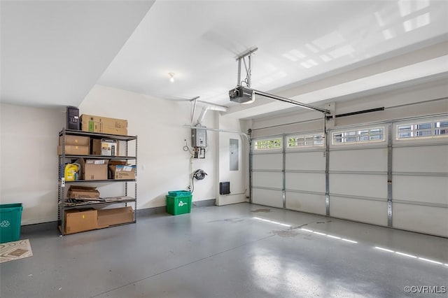10925 Parkshire Ln, Henrico, VA 23233 - garage with a garage door opener, electric panel, and baseboards