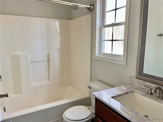 full bathroom featuring vanity, shower / tub combination, and toilet