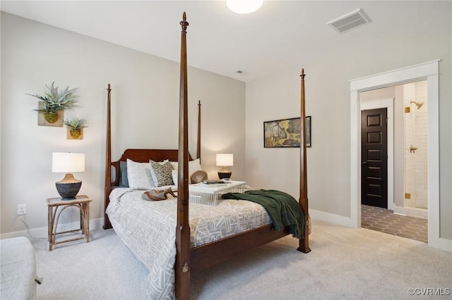 carpeted bedroom featuring visible vents and baseboards