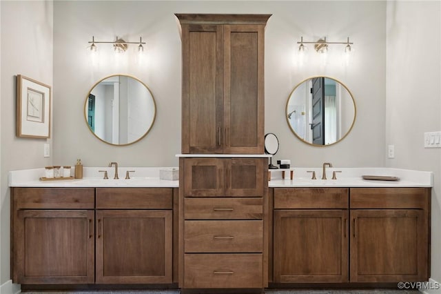 bathroom with two vanities and a sink