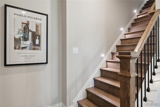 stairs featuring baseboards