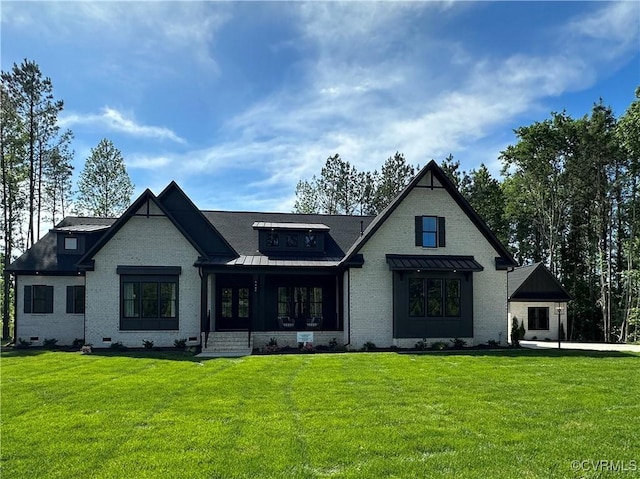 0 Three Chopt Rd, Gum Spring, VA 23065 - back of property featuring brick siding, a standing seam roof, a lawn, and metal roof