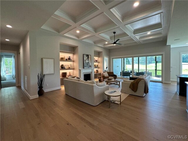 0 Three Chopt Rd, Gum Spring, VA 23065 - living area featuring a fireplace, hardwood / wood-style flooring, a ceiling fan, beam ceiling, and baseboards