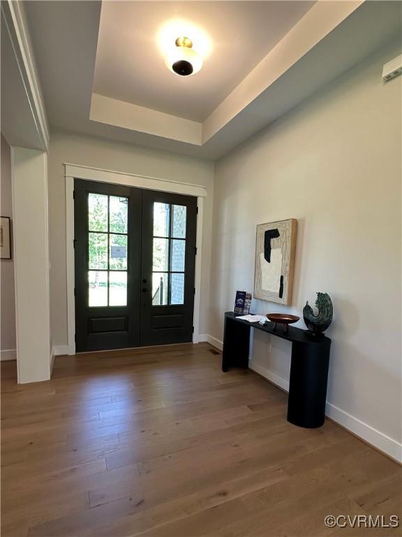 0 Three Chopt Rd, Gum Spring, VA 23065 - foyer entrance with french doors, baseboards, a raised ceiling, and wood finished floors