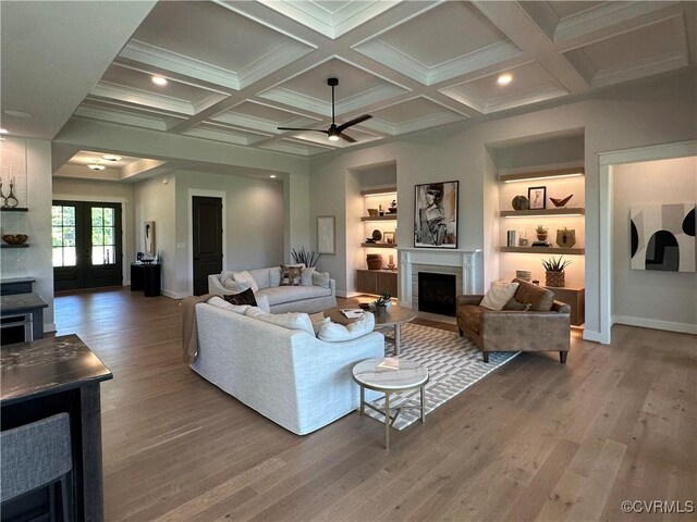 0 Three Chopt Rd, Gum Spring, VA 23065 - living room featuring a fireplace with flush hearth, a ceiling fan, wood finished floors, beamed ceiling, and coffered ceiling