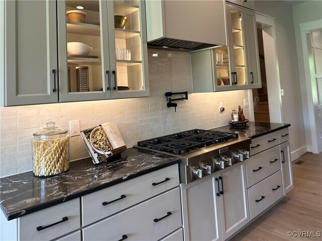 0 Three Chopt Rd, Gum Spring, VA 23065 - kitchen with stainless steel gas cooktop, custom range hood, light wood-type flooring, and dark stone countertops