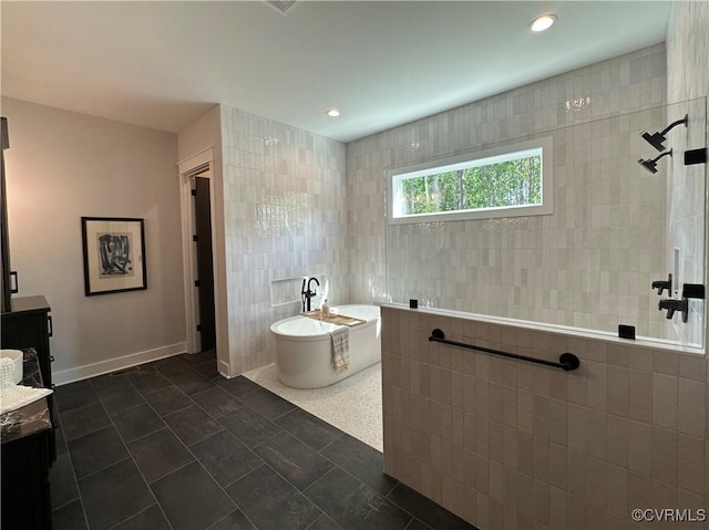 0 Three Chopt Rd, Gum Spring, VA 23065 - full bath with tile walls, walk in shower, a freestanding tub, and recessed lighting