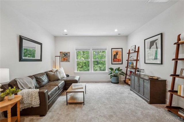 carpeted living room with baseboards and recessed lighting