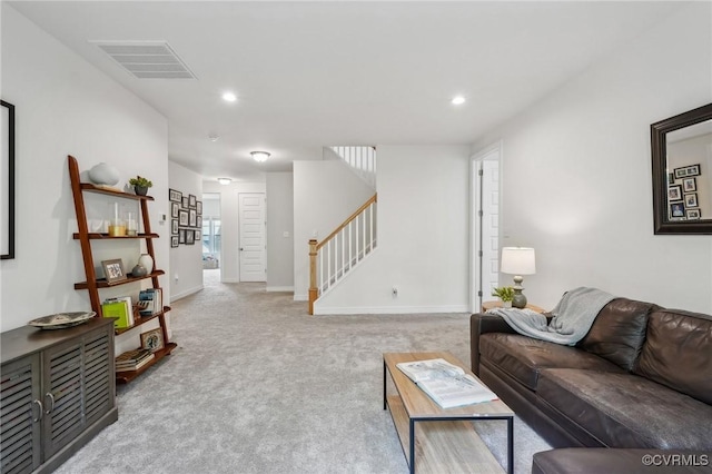 living room featuring recessed lighting, baseboards, visible vents, stairway, and carpet floors