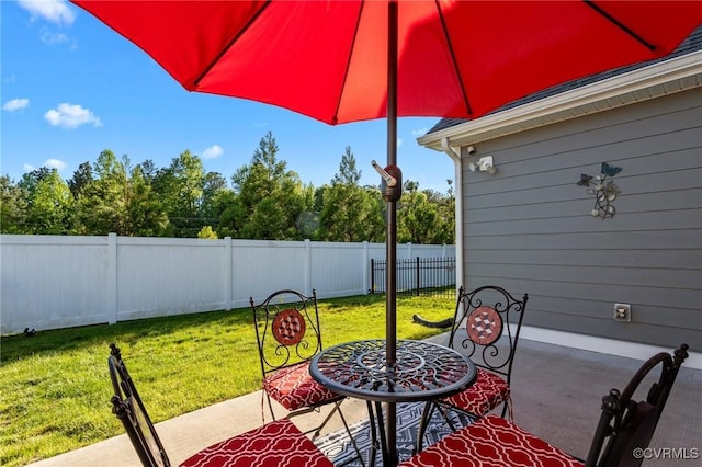 view of patio / terrace with fence