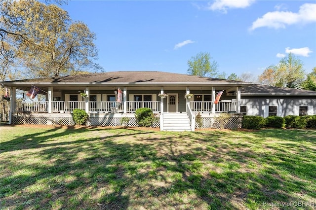 view of front of home featuring a front yard and covered porch