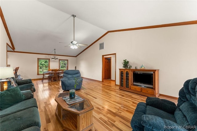 living room with light wood-type flooring, ceiling fan, lofted ceiling, ornamental molding, and visible vents