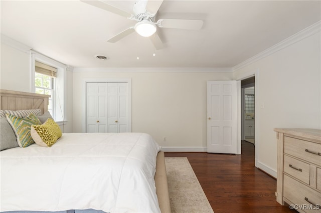 bedroom with crown molding, a ceiling fan, dark wood-style floors, and visible vents
