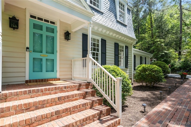 entrance to property with covered porch