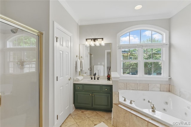 bathroom featuring crown molding, a whirlpool tub, vanity, and a healthy amount of sunlight