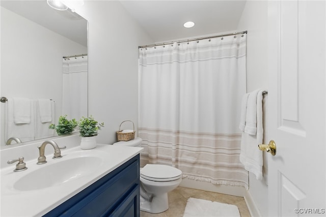 bathroom featuring shower / bath combination with curtain, tile patterned flooring, vanity, and toilet