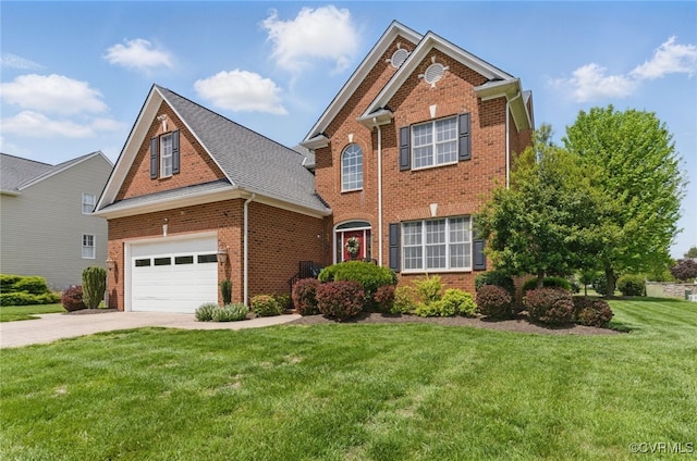 traditional home featuring a front lawn, driveway, and brick siding