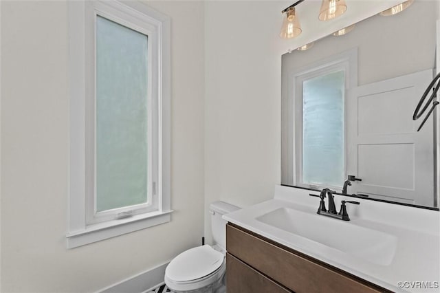 810 N 32nd St, Richmond, VA 23223 - bathroom featuring healthy amount of natural light, vanity, and toilet