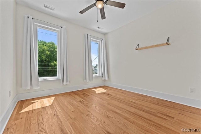 810 N 32nd St, Richmond, VA 23223 - spare room with wood finished floors, ceiling fan, and baseboards