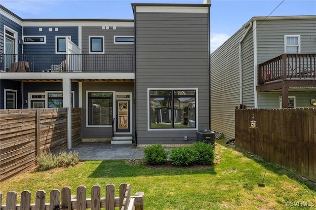 810 N 32nd St, Richmond, VA 23223 - rear view of property featuring entry steps, cooling unit, a patio area, and a balcony