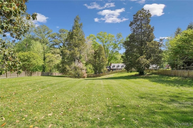 view of yard featuring fence