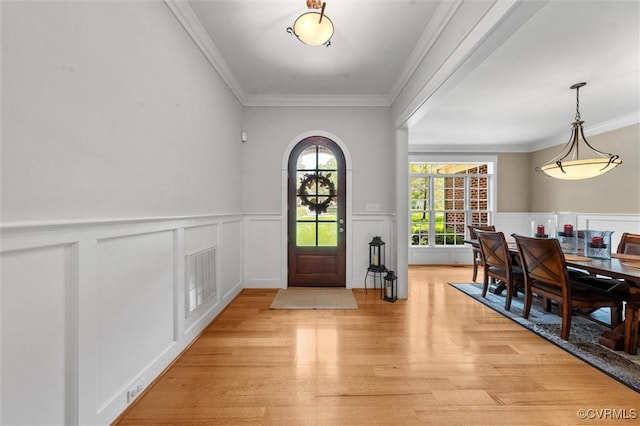 12712 Dell Hill Ct, Chesterfield, VA 23831 - foyer featuring light wood-type flooring, a decorative wall, and crown molding