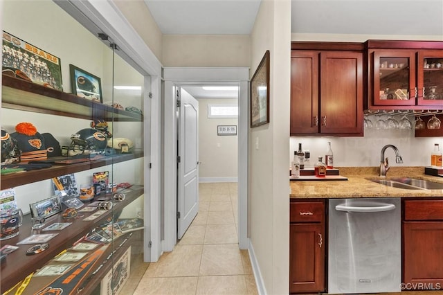 12712 Dell Hill Ct, Chesterfield, VA 23831 - kitchen featuring a sink, glass insert cabinets, dishwasher, light tile patterned floors, and light stone countertops