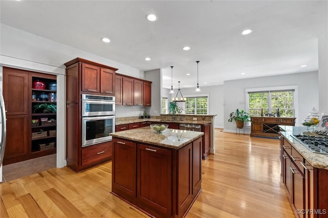 12712 Dell Hill Ct, Chesterfield, VA 23831 - kitchen featuring recessed lighting, a peninsula, appliances with stainless steel finishes, and light wood-style flooring
