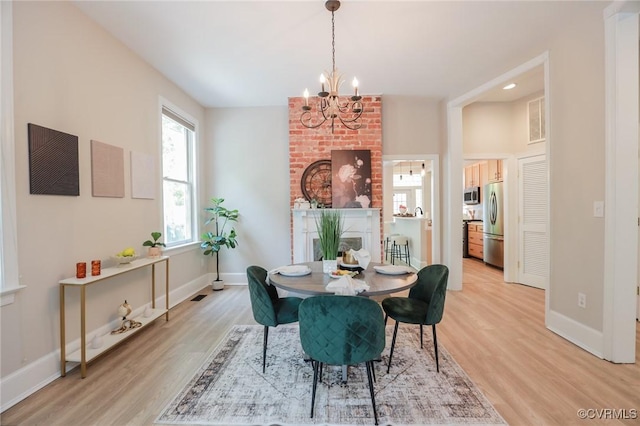 6 S Rowland St, Richmond, VA 23220 - dining area with recessed lighting, baseboards, a chandelier, and light wood-style flooring
