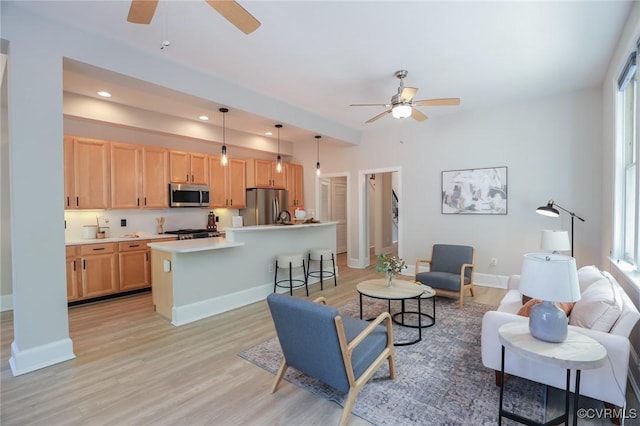 6 S Rowland St, Richmond, VA 23220 - living area with a ceiling fan, baseboards, recessed lighting, and light wood-style flooring