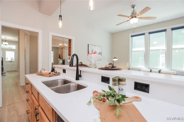 6 S Rowland St, Richmond, VA 23220 - kitchen featuring ceiling fan with notable chandelier, decorative light fixtures, a sink, and light brown cabinetry