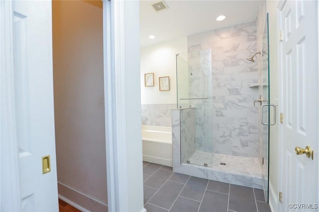 6 S Rowland St, Richmond, VA 23220 - bathroom featuring recessed lighting, a shower stall, tile patterned flooring, visible vents, and a bath