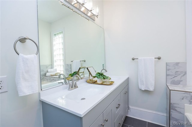 6 S Rowland St, Richmond, VA 23220 - bathroom featuring baseboards and vanity