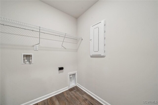 clothes washing area featuring laundry area, electric panel, baseboards, washer hookup, and dark wood-style flooring