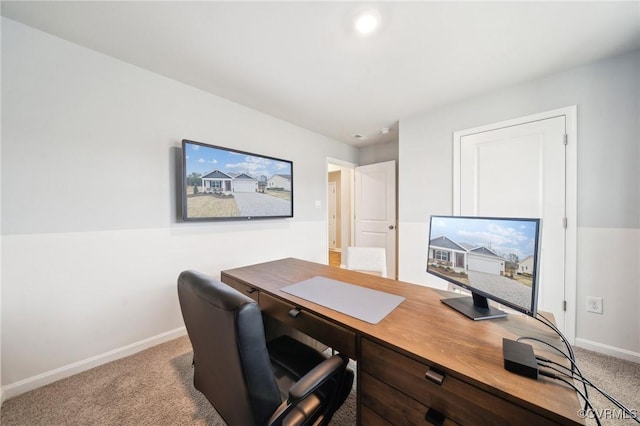 office space featuring baseboards and carpet flooring