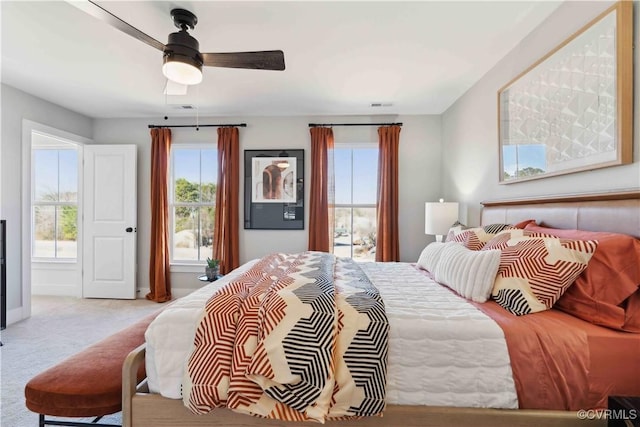 15307 Sunray Way, Chesterfield, VA 23832 - carpeted bedroom featuring multiple windows, baseboards, and a ceiling fan