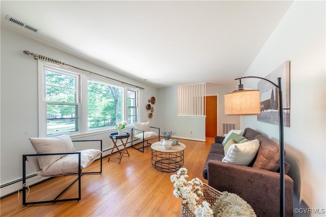 8000 N Courthouse Rd, New Kent, VA 23124 - living area with visible vents, light wood-style flooring, and baseboards
