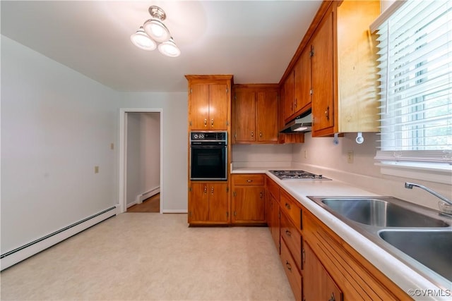 8000 N Courthouse Rd, New Kent, VA 23124 - kitchen featuring a sink, a baseboard heating unit, oven, and brown cabinets